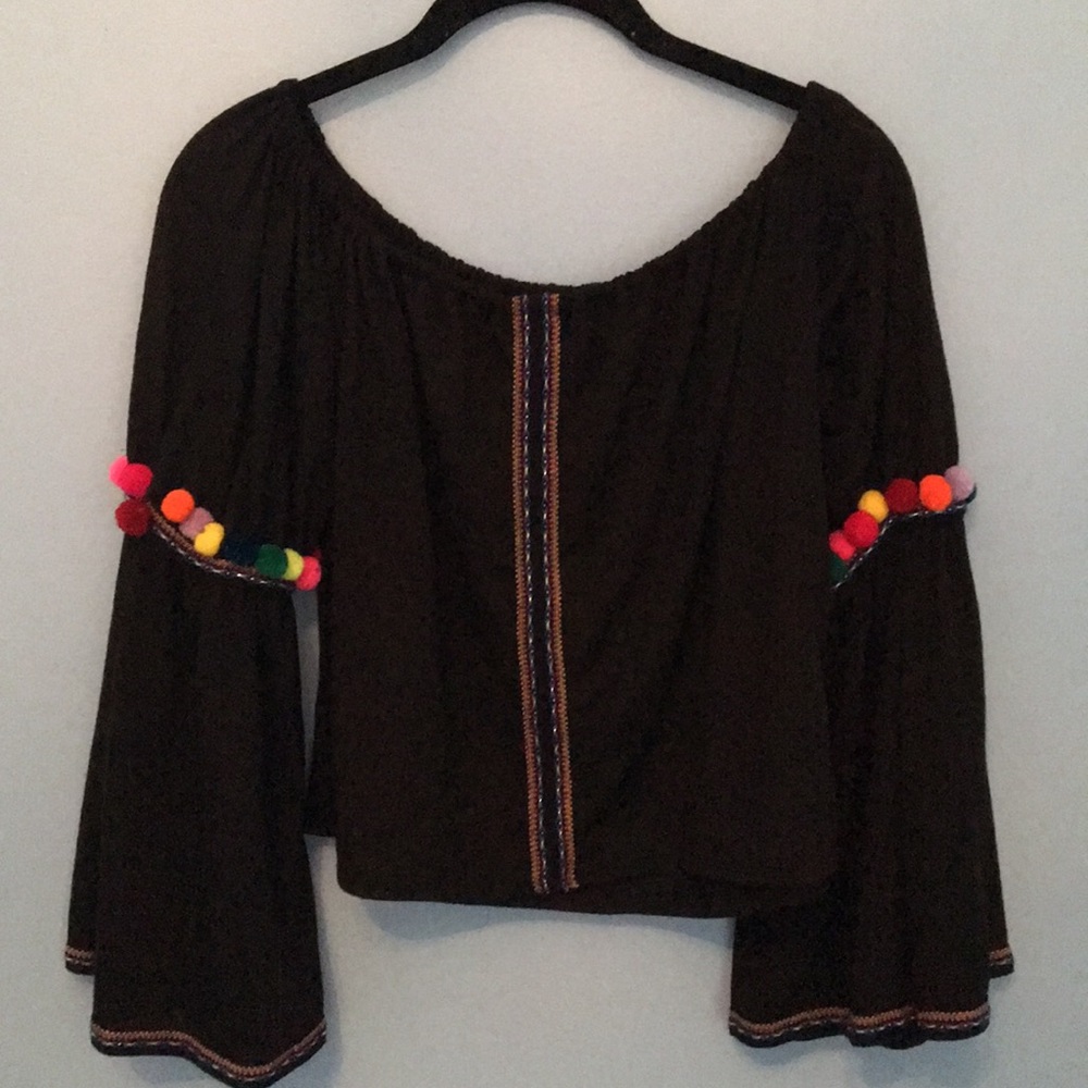 Fun flowy bright pom pom sleeve top